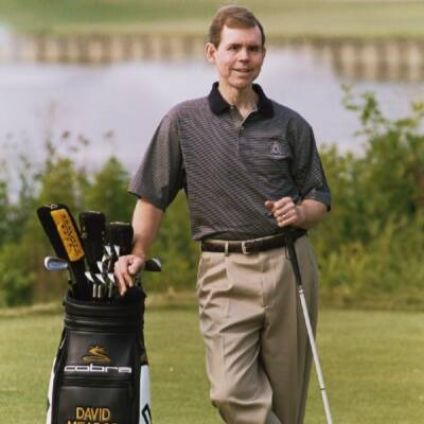 David Meador standing next to his golf bag