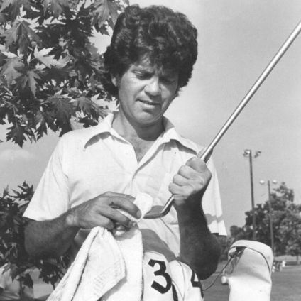 Ed Brantly holding a golf club
