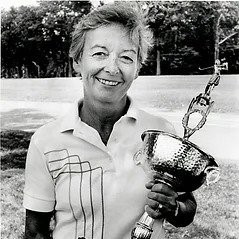 Jean St. Charles holding a trophy